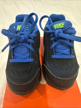 Nike Kids Black and Blue Athletic Sneakers with Neon Logo